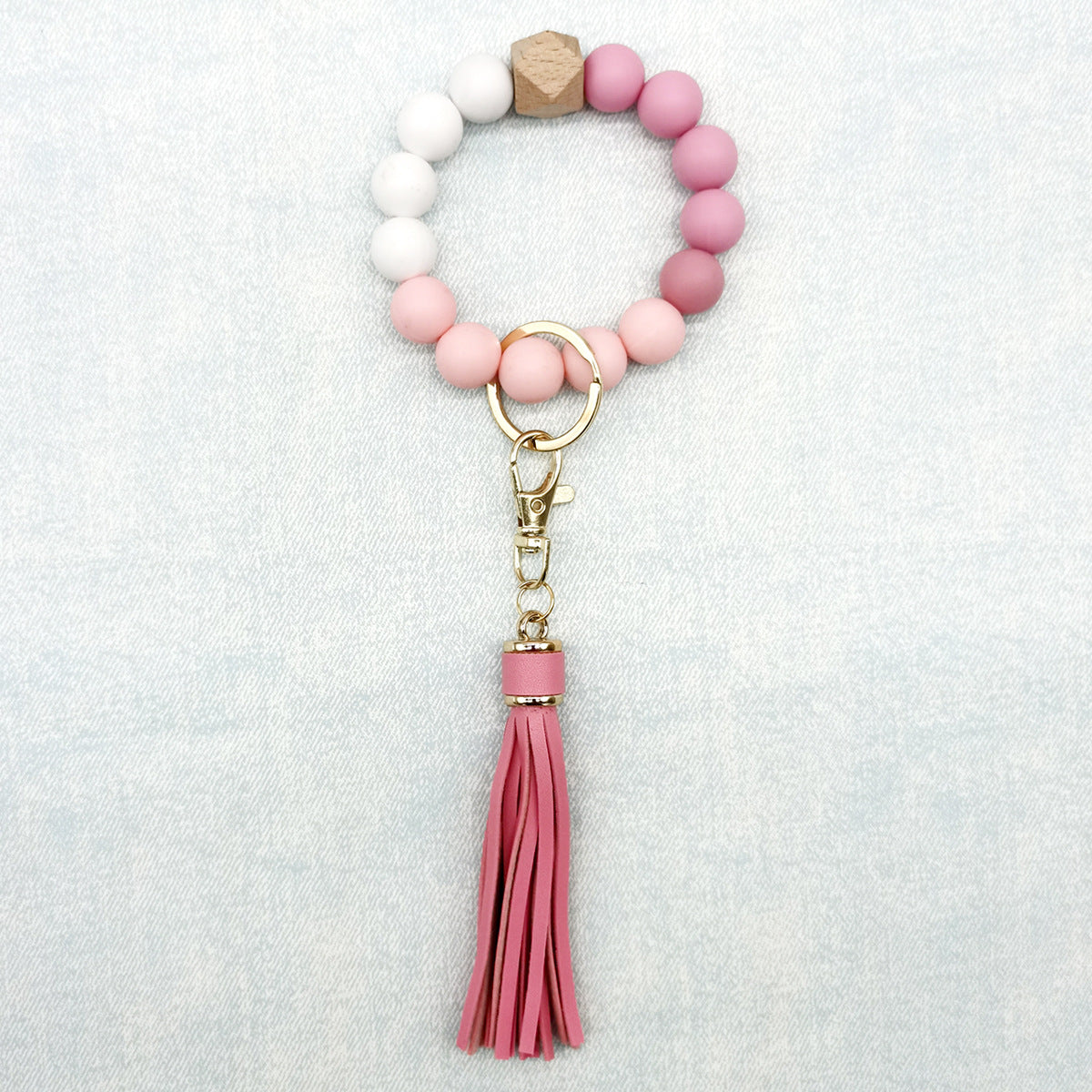 Pulsera de cuentas de silicona con borlas al por mayor llavero de muñeca